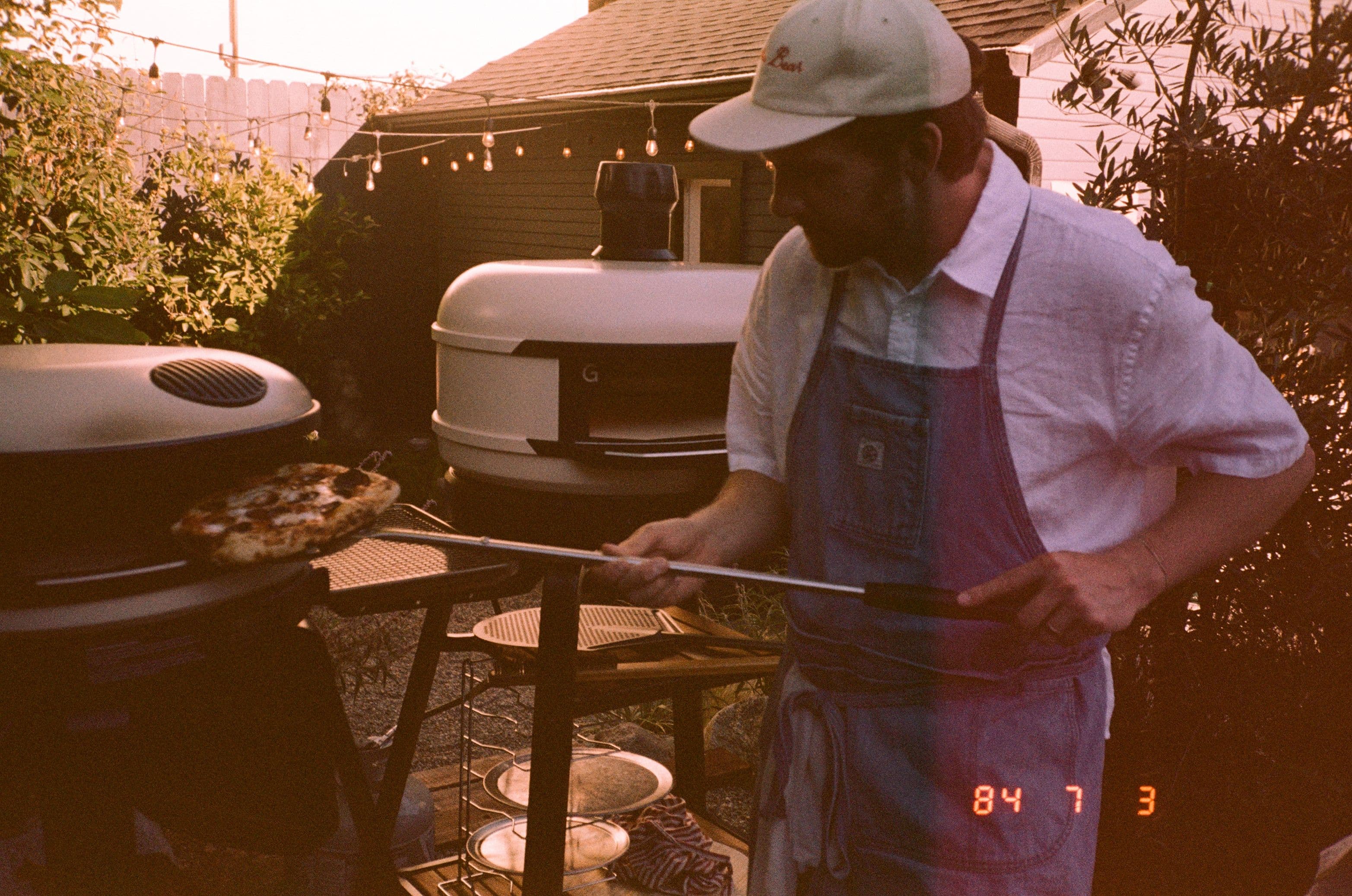 Garrett cooking pizza
